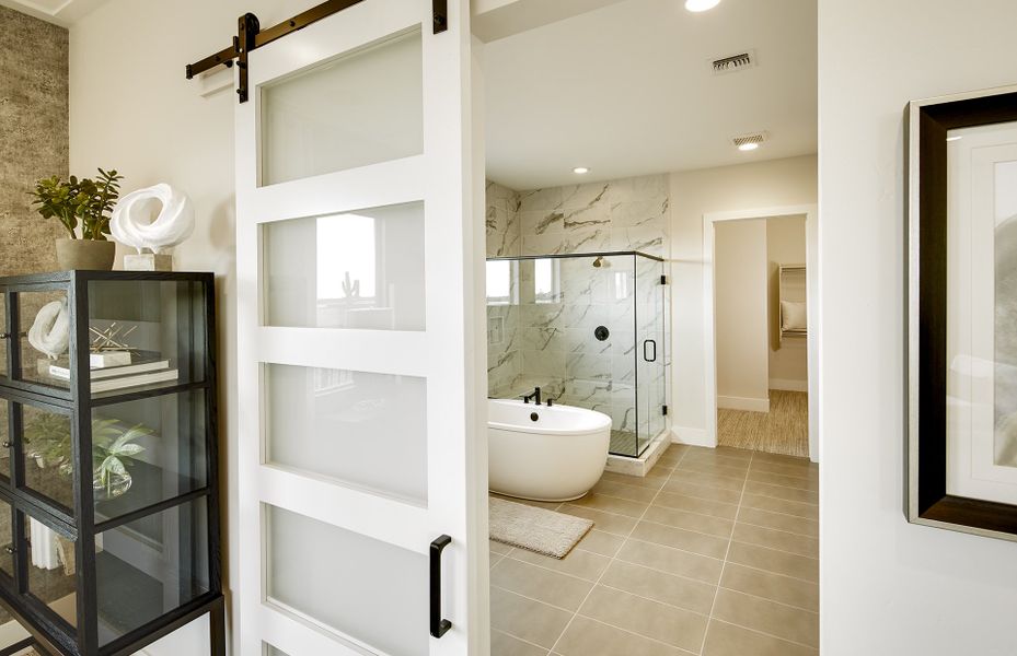 The owner’s suite includes a private bathroom with dual sinks