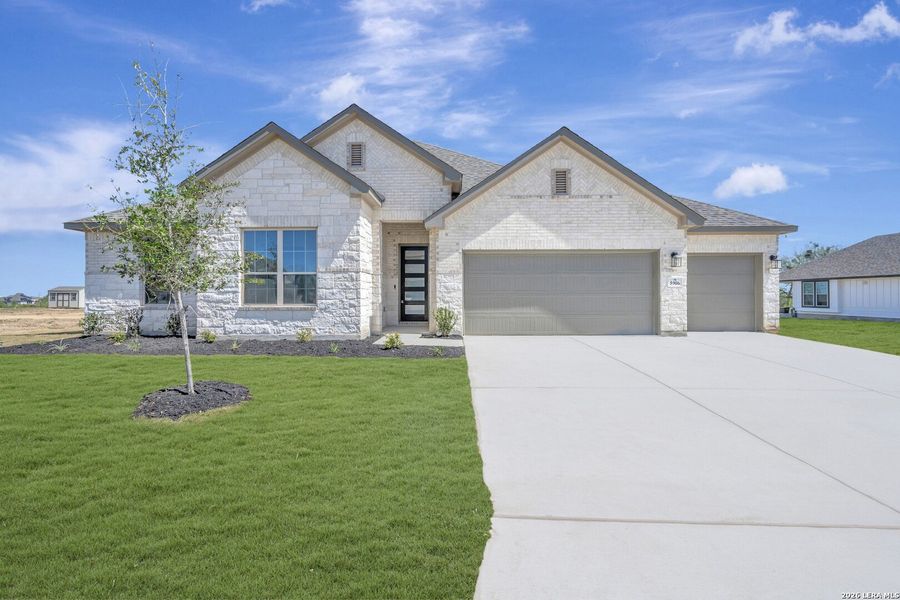 Front exterior of a new home in Preserve at Annabelle Ranch, San Antonio, TX, highlighting curb appeal (Image 23).
