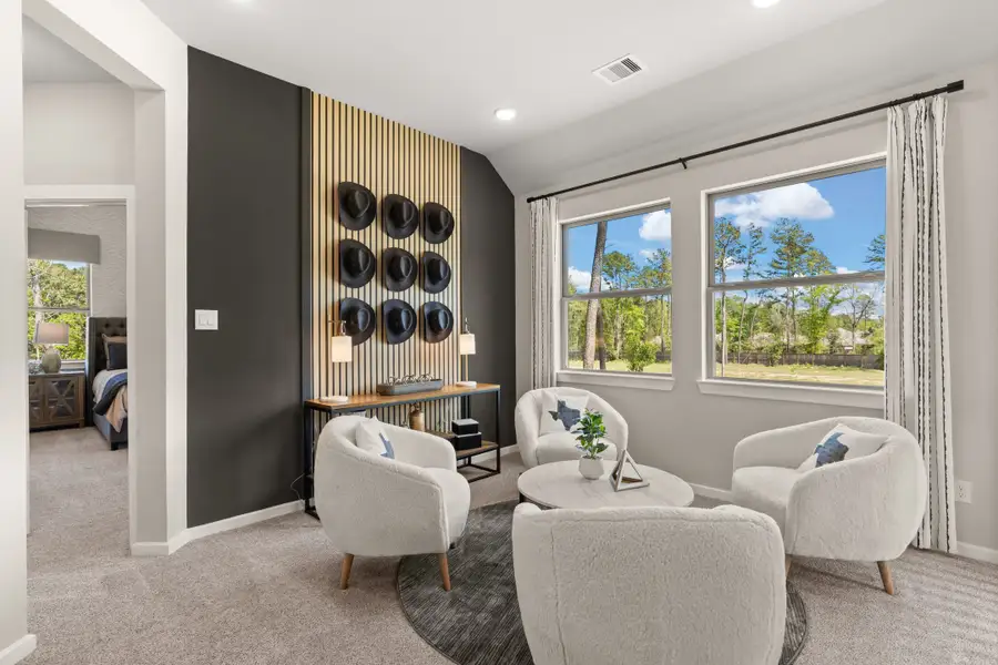 Furnished interior view inside a new home in The Woodlands Hills, Willis (Image 9).