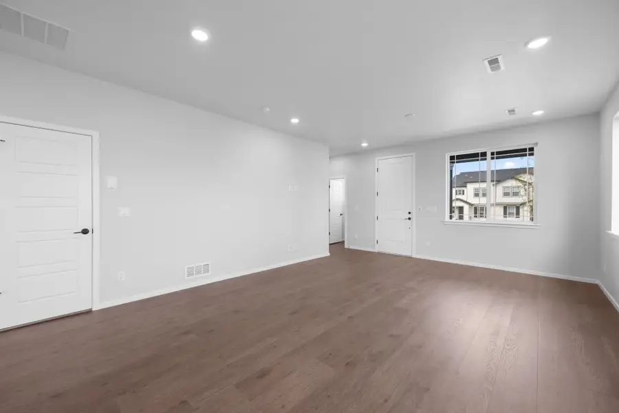 Spacious, unfurnished interior of a new home in Sky Ranch, Watkins (Image 23).