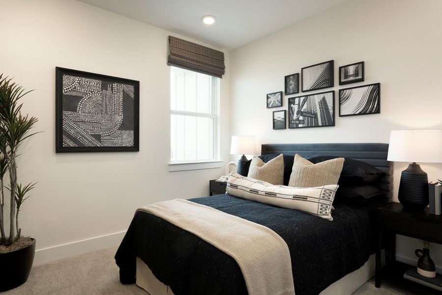 Representative furnished interior of a home built from the Rachelle by Risewell Homes in Avery Centre, Round Rock (Image 8).