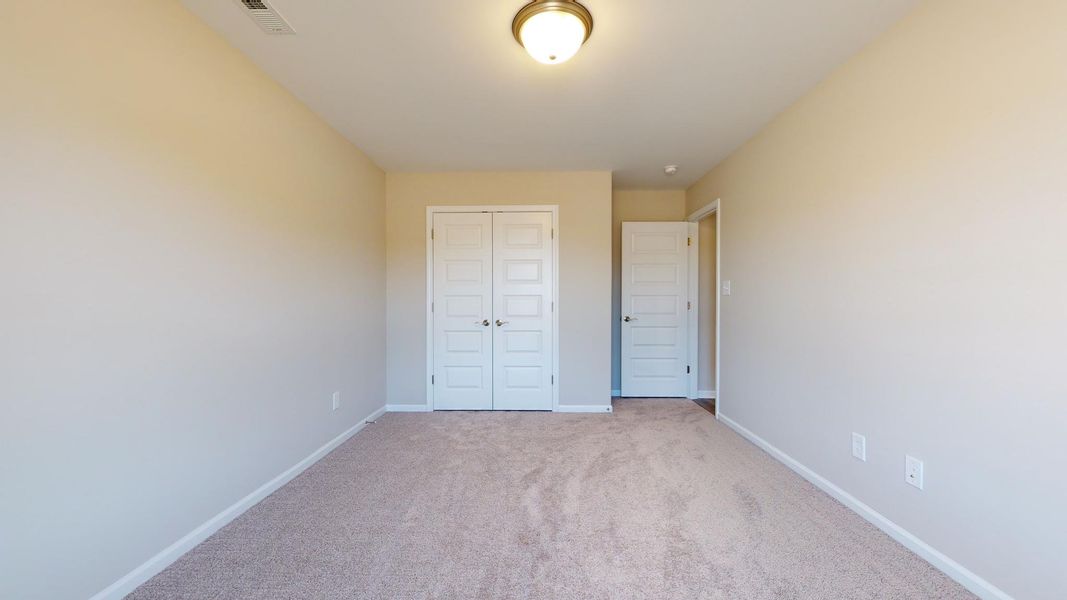 Representative unfurnished interior of a home built from the Corbin A by JC Jackson Homes,LLC in Heritage Pointe, Newport (Image 21).