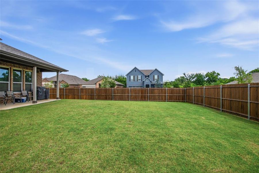 Exterior details and patio area of a home in , Denton (Image 4).