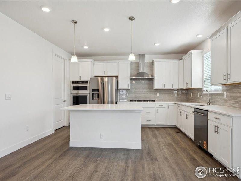 Furnished interior view inside a new home in Vantage, Berthoud (Image 6).