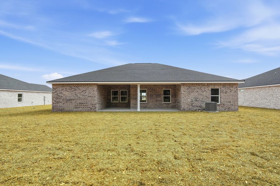 Exterior details and patio area of a home in Southern Charm, Crestview (Image 32).