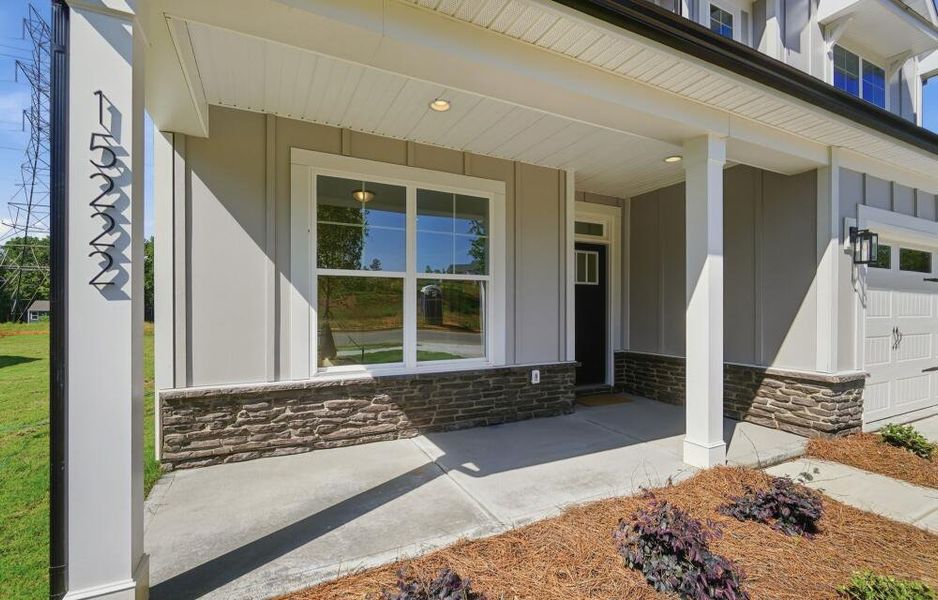 Exterior details and patio area of a home in Enclave at Riverdale, Huntersville (Image 2).