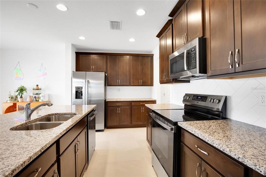 Furnished interior view inside a new home in Horse Creek at Crosswinds, Davenport (Image 19). Furnished interior view inside a new home in Horse Creek at Crosswinds, Davenport (Image 19).