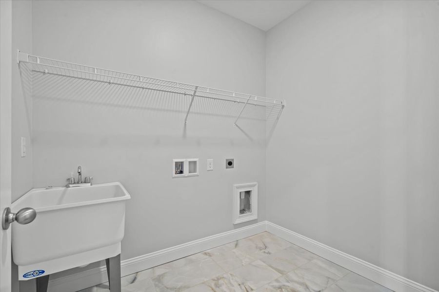 Representative unfurnished interior of a home built from the Roosevelt by Enchanted Homes in Guadalupe Heights, Seguin (Image 41).