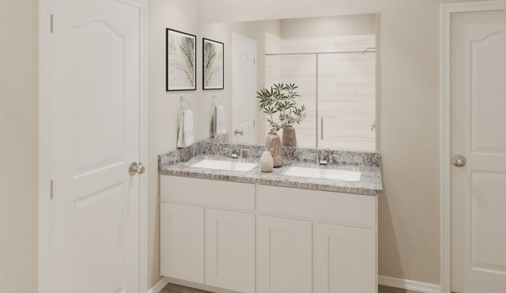 A bathroom with a marble countertop.