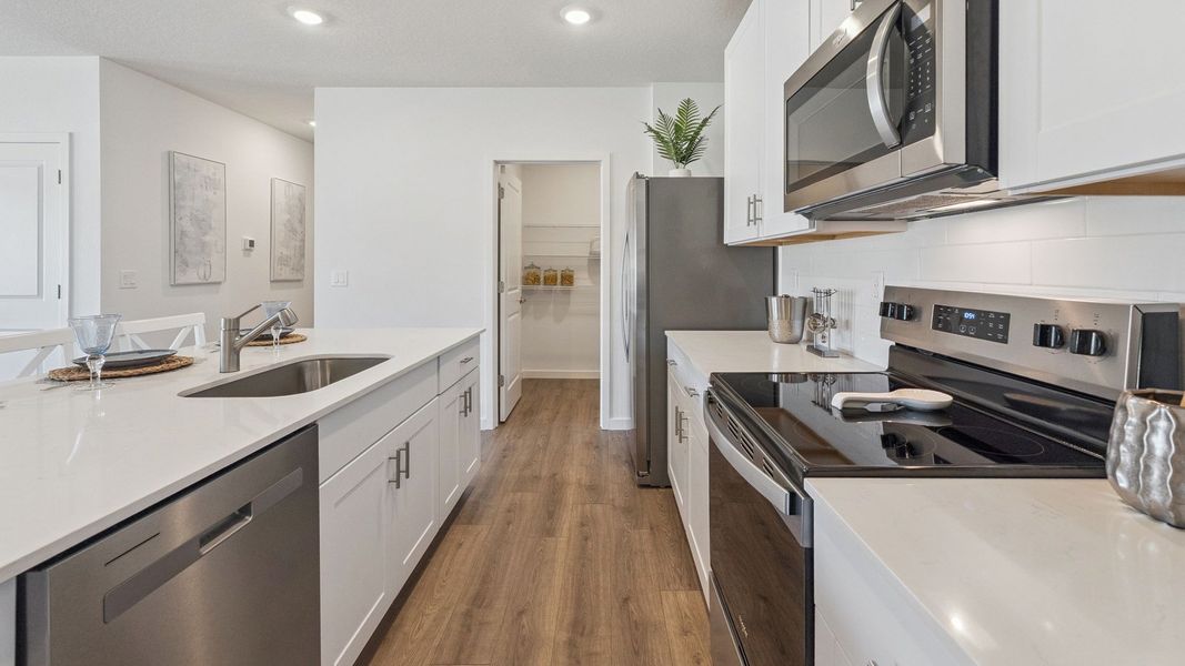 Furnished interior view inside a new home in Halifax Plantation Villas, Ormond Beach (Image 7).