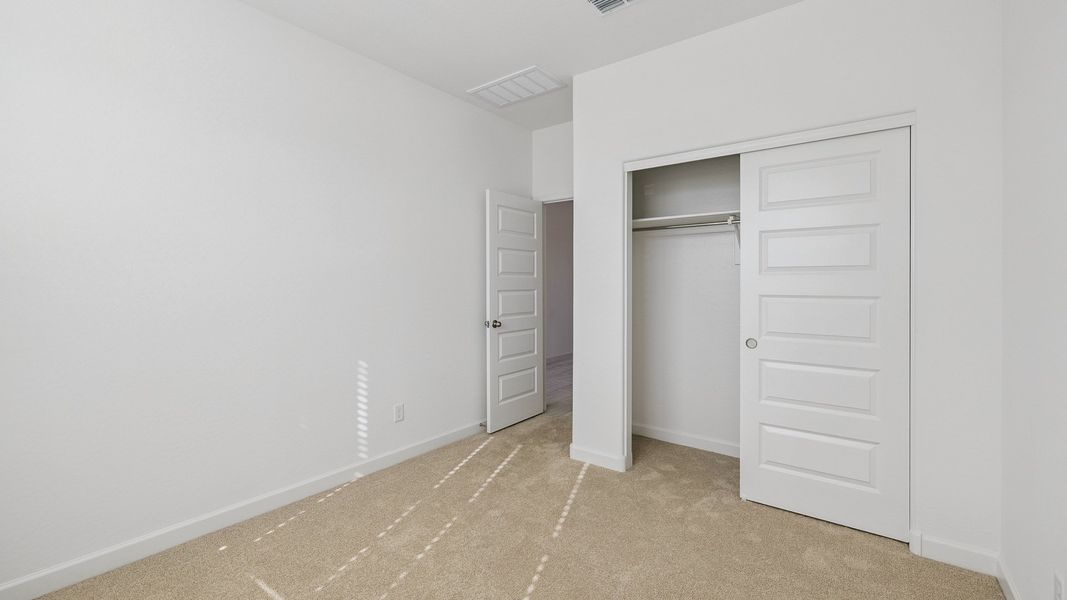 Spacious, unfurnished interior of a new home in Desert Moon Estates, Buckeye (Image 28). Spacious, unfurnished interior of a new home in Desert Moon Estates, Buckeye (Image 28).