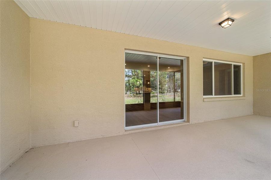 Exterior details and patio area of a home in , Ocala (Image 40).