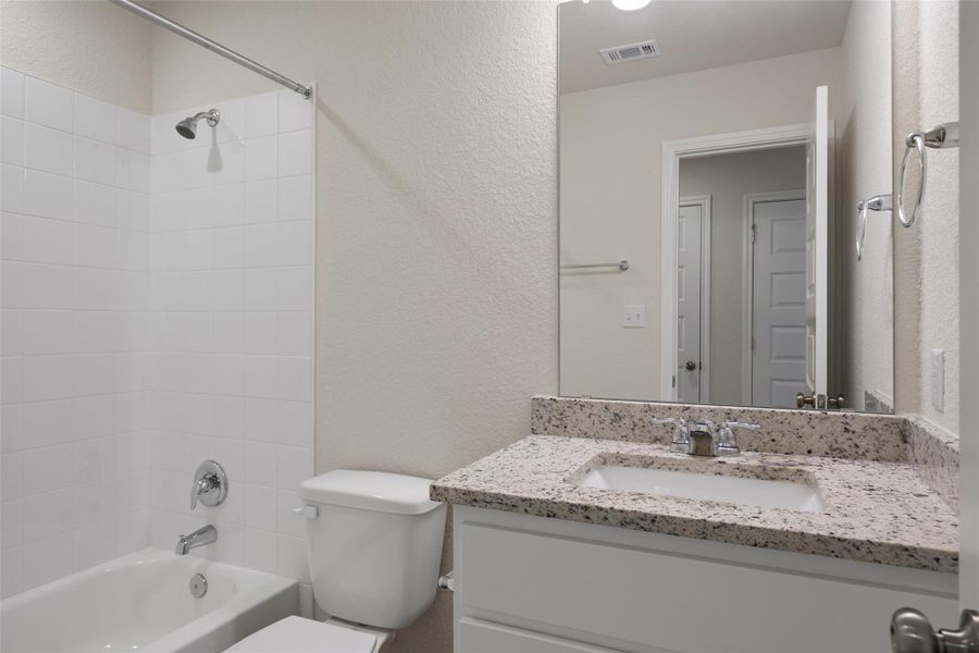 Furnished interior view inside a new home in Avery Centre, Round Rock (Image 19).