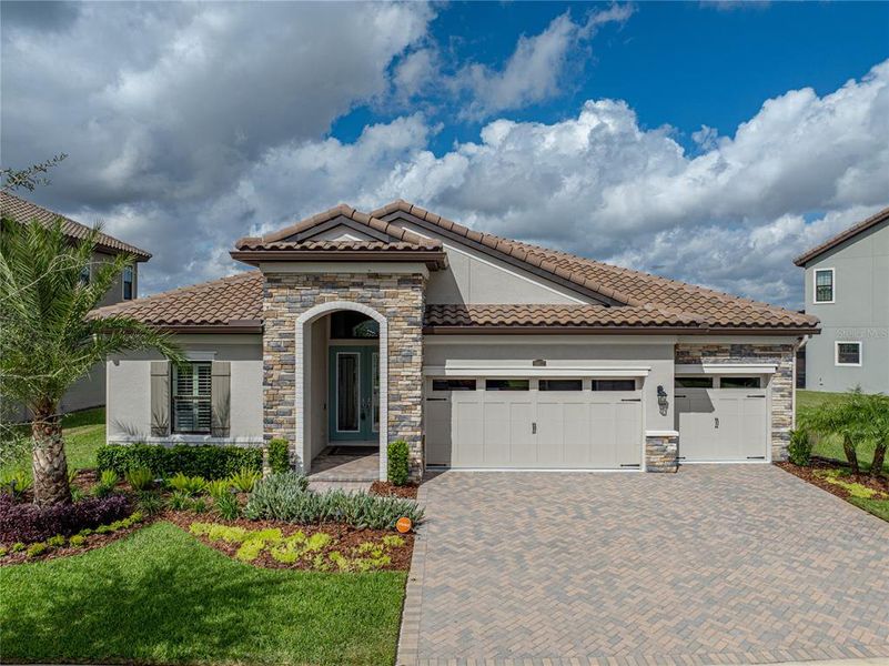 Front exterior of a new home in Mirada, San Antonio, FL, highlighting curb appeal (Image 23). Front exterior of a new home in Mirada, San Antonio, FL, highlighting curb appeal (Image 23).