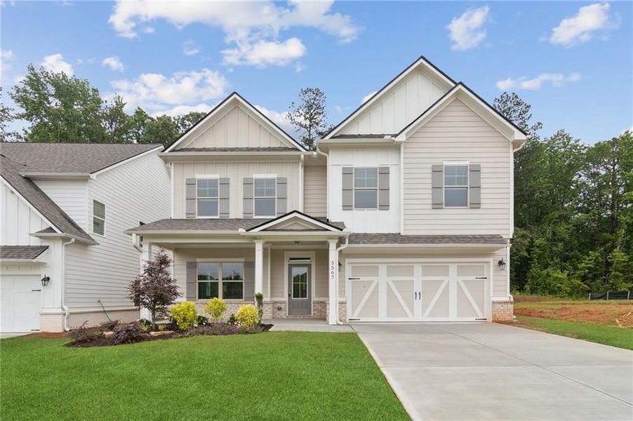Front exterior of a new home in , Flowery Branch, GA, highlighting curb appeal (Image 1).