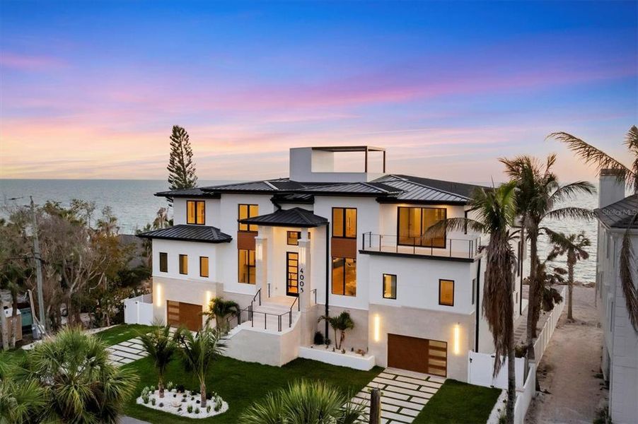 Front exterior of a new home in , Nokomis, FL, highlighting curb appeal (Image 1).