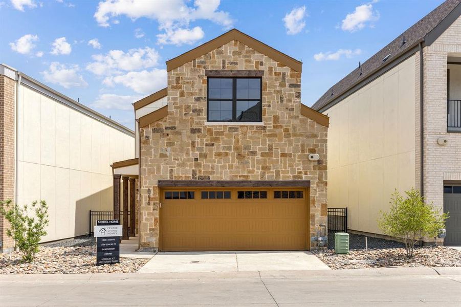 Front exterior of a new home in Merion at Midtown Park, Dallas, TX, highlighting curb appeal (Image 18). Front exterior of a new home in Merion at Midtown Park, Dallas, TX, highlighting curb appeal (Image 18).