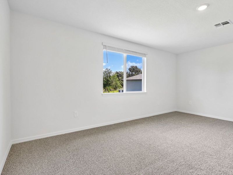 Spacious, unfurnished interior of a new home in The Grove at Stuart Crossing - Signature Series, Bartow (Image 14). Spacious, unfurnished interior of a new home in The Grove at Stuart Crossing - Signature Series, Bartow (Image 14).
