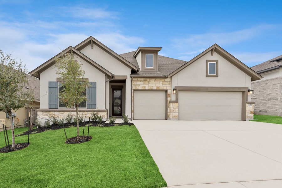 Front exterior of a new home in La Cima, San Marcos, TX, highlighting curb appeal (Image 20).