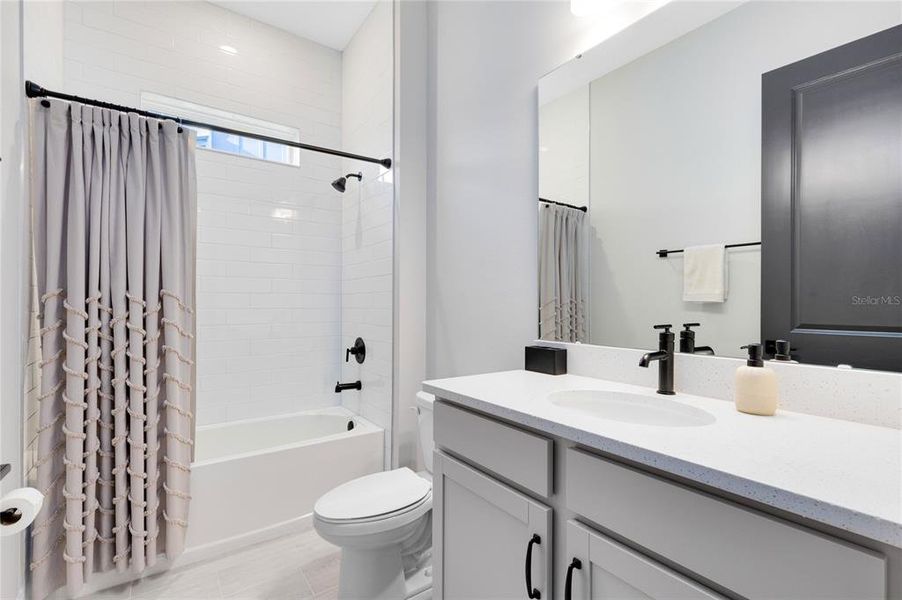 Furnished interior view inside a new home in Laureate Park, Orlando (Image 18).