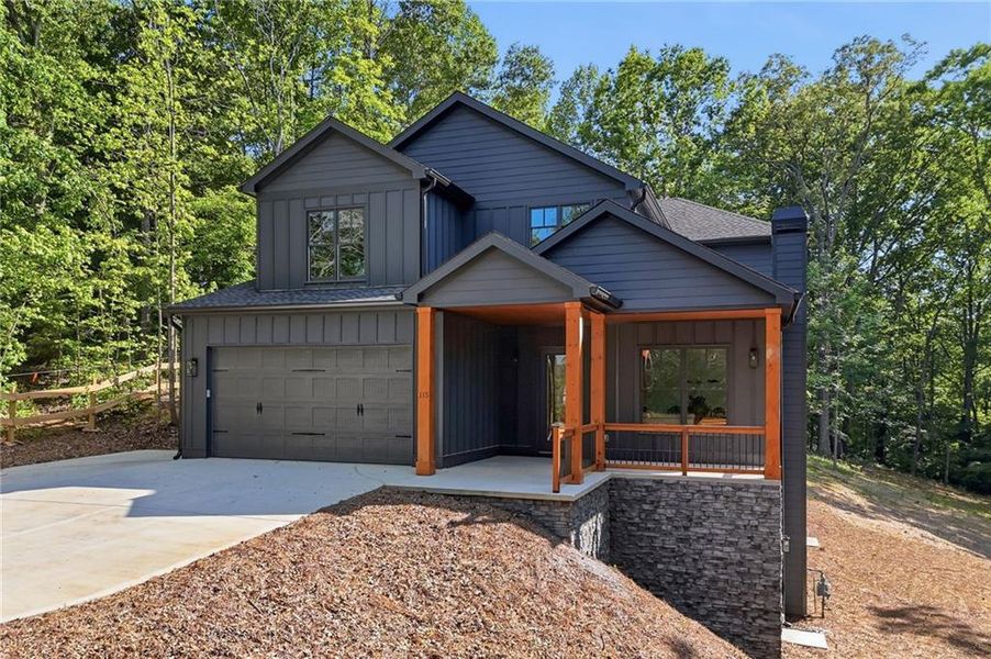 Front exterior of a new home in , Canton, GA, highlighting curb appeal (Image 34).