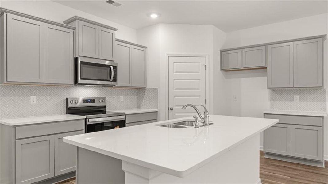 Furnished interior view inside a new home in The Reserve at Calcutta, Stockbridge (Image 7).