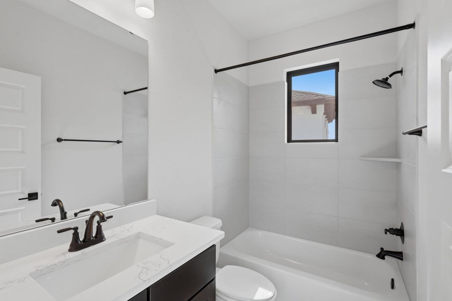 Furnished interior view inside a new home in Sienna, Missouri City (Image 17).