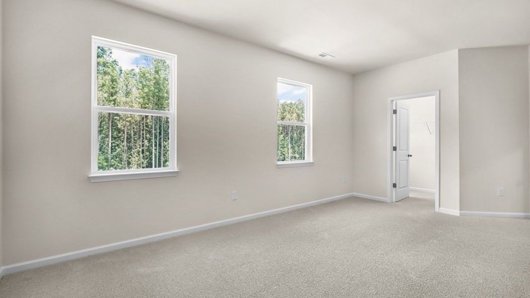 Spacious, unfurnished interior of a new home in The Townes at Madden West, Fuquay Varina (Image 15).