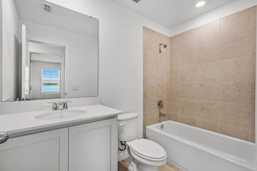 Furnished interior view inside a new home in Catamaran Cove, Rockledge (Image 15).