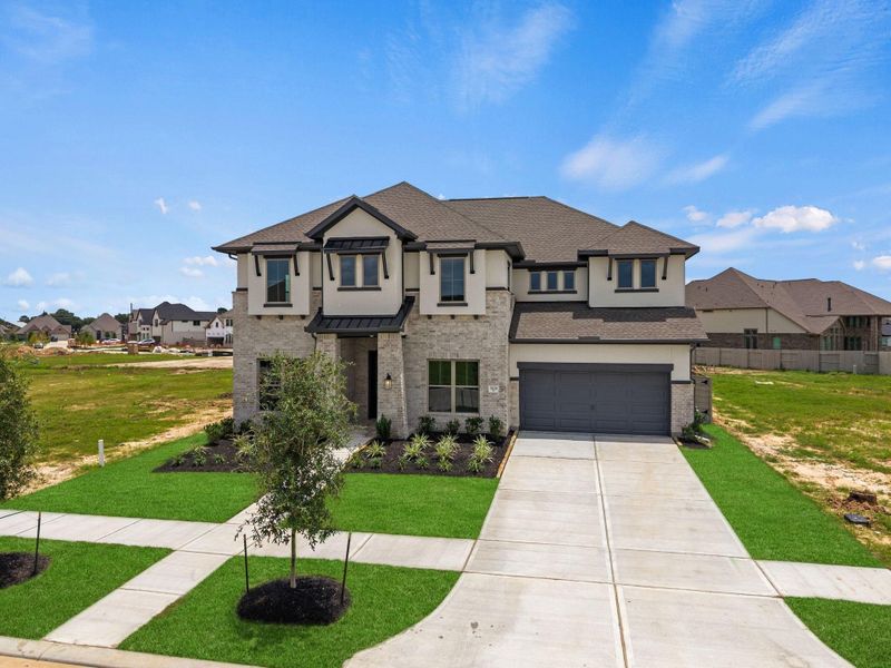 Front exterior of a new home in Pomona, Manvel, TX, highlighting curb appeal (Image 20).