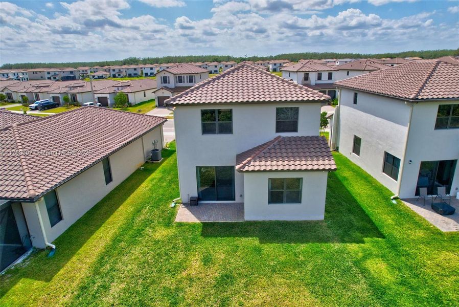 Front exterior of a new home in , Ave Maria, FL, highlighting curb appeal (Image 18).