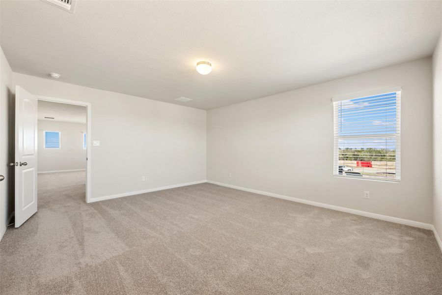 Spacious, unfurnished interior of a new home in The Colony 45s, Bastrop (Image 27).