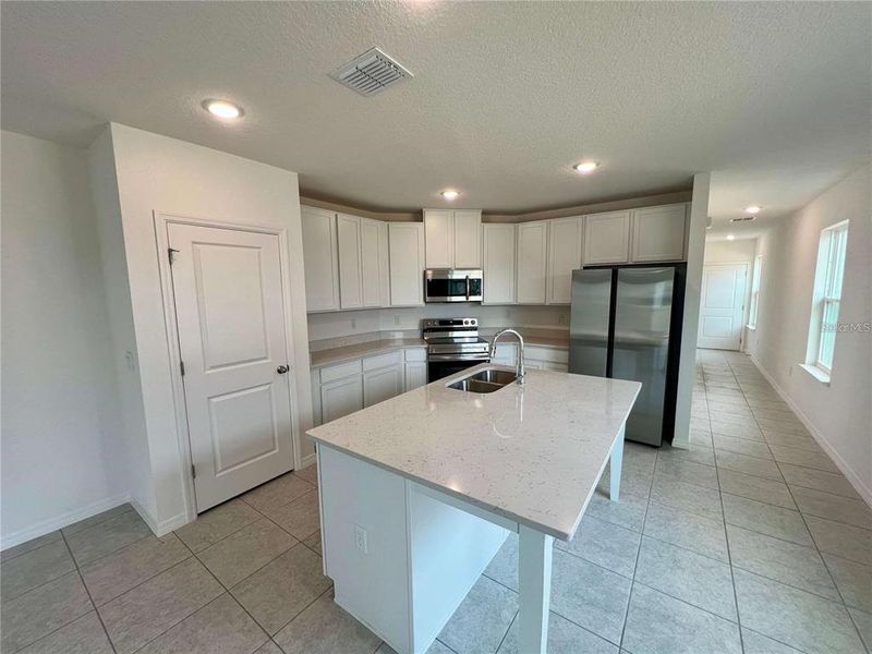 Furnished interior view inside a new home in Villamar, Winter Haven (Image 7). Furnished interior view inside a new home in Villamar, Winter Haven (Image 7).