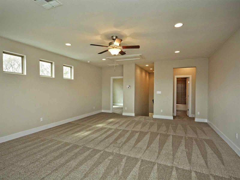 Representative unfurnished interior of a home built from the Madera II by Giddens Homes in Scofield Farms Estates, Georgetown (Image 429).