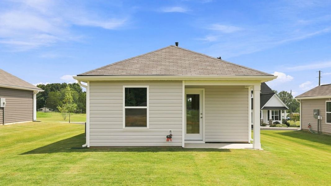Exterior details and patio area of a home in Village 3, Woodruff (Image 3).