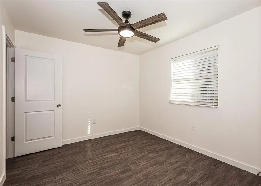 2nd Primary Bedroom featuring  wood-style floors and ceiling fan