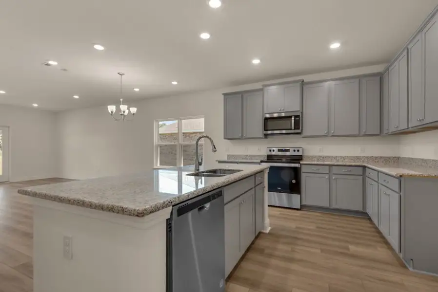 Representative furnished interior of a home built from the Destin by Holiday Builders in Yellow River Ranch, Milton (Image 4). Representative furnished interior of a home built from the Destin by Holiday Builders in Yellow River Ranch, Milton (Image 4).