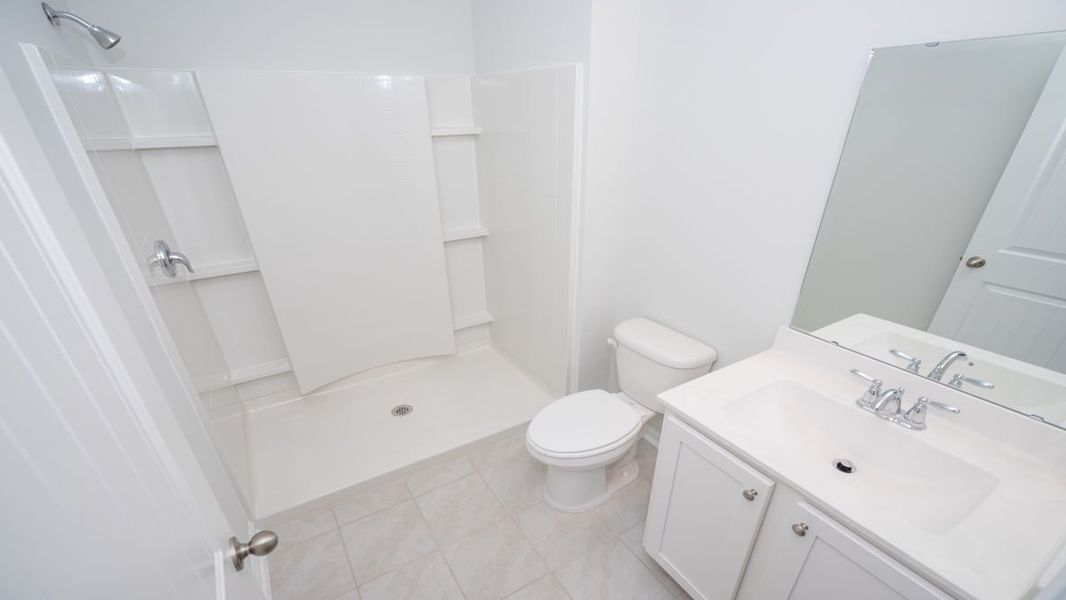 Representative unfurnished interior of a home built from the ROBIE by D.R. Horton in Indigo Preserve, Leland (Image 18).