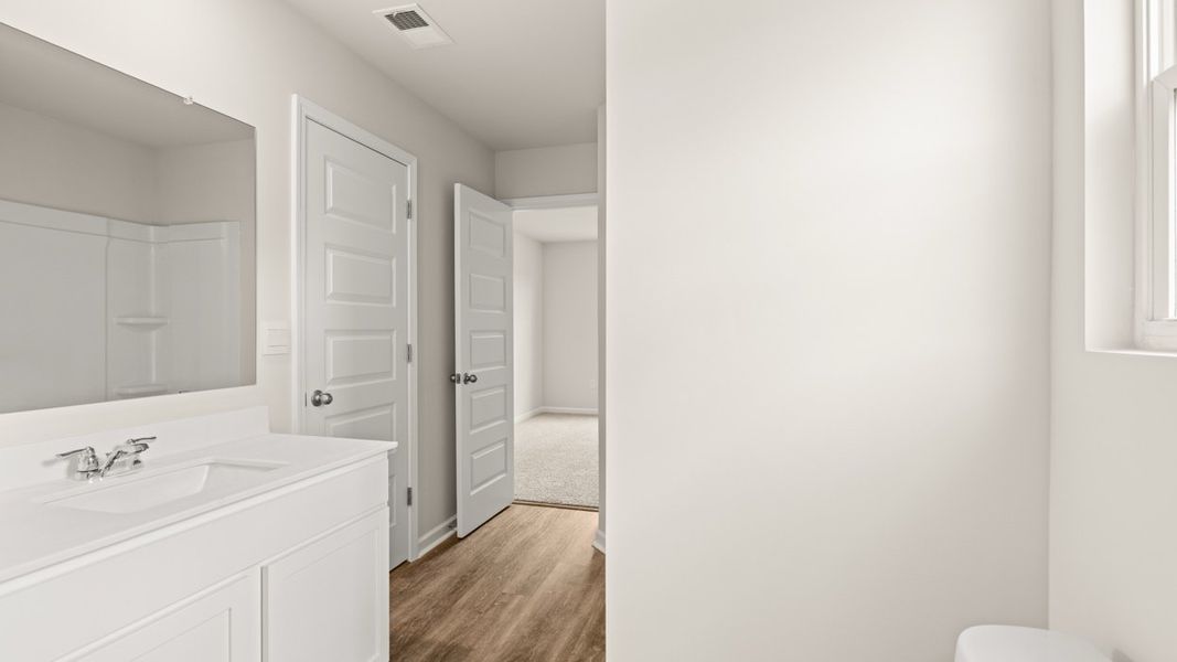 Spacious, unfurnished interior of a new home in Preserve at Dove Creek, Statham (Image 37).