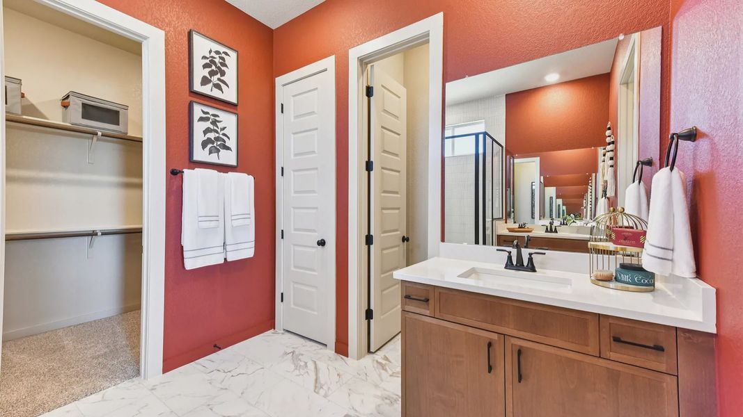 Representative furnished interior of a home built from the Peyton by Chesmar Homes in The Grove at Blackhawk, Pflugerville (Image 37).