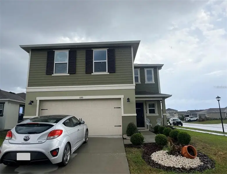 Front exterior of a new home in , Auburndale, FL, highlighting curb appeal (Image 2). Front exterior of a new home in , Auburndale, FL, highlighting curb appeal (Image 2).