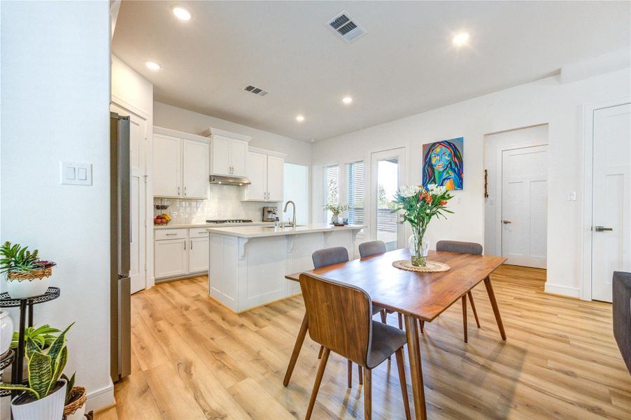 Furnished interior view inside a new home in Easthaven at Bridgeland Central, Cypress (Image 9).