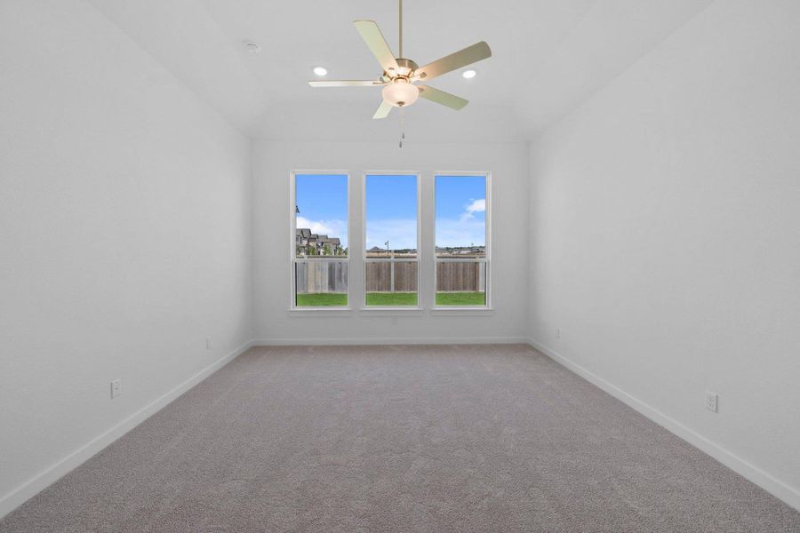 Primary Bedroom with elevated ceiling Primary Bedroom with elevated ceiling