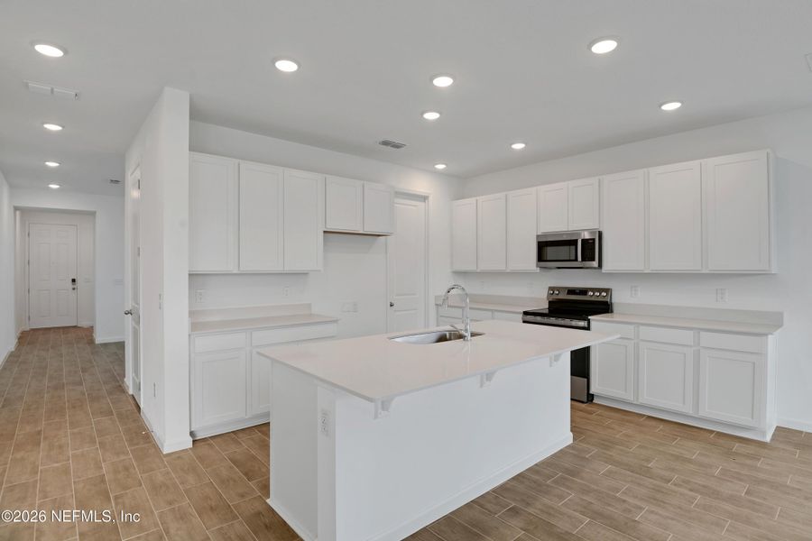 Furnished interior view inside a new home in Seasons at Grandview Gardens, Deland (Image 9).