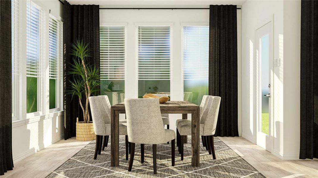 Dining area featuring light hardwood / wood-style flooring