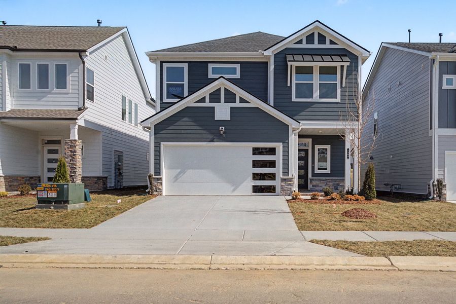 Front exterior of a new home in Nexus – Park Collection, Gallatin, TN, highlighting curb appeal (Image 21).