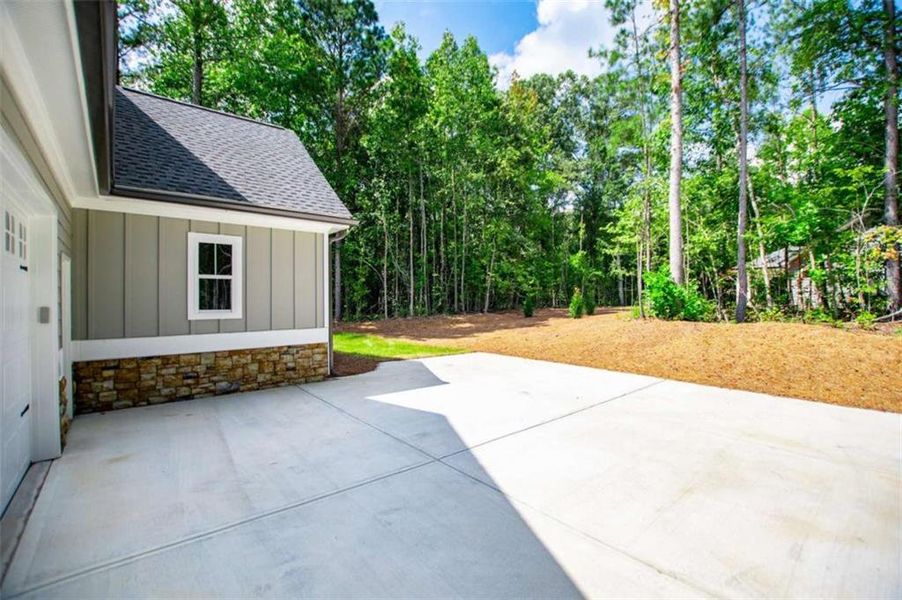 Front exterior of a new home in , Douglasville, GA, highlighting curb appeal (Image 33).