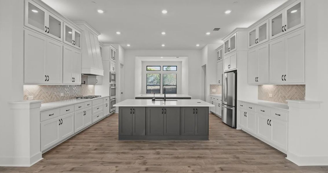 Representative furnished interior of a home built from the Allison by Chesmar Homes in Sweetwater, Austin (Image 7).