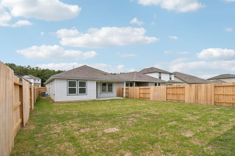 Front exterior of a new home in Landing Meadows - Traditional Series, New Caney, TX, highlighting curb appeal (Image 19). Front exterior of a new home in Landing Meadows - Traditional Series, New Caney, TX, highlighting curb appeal (Image 19).