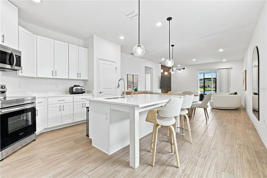 Furnished interior view inside a new home in , Harmony (Image 15). Furnished interior view inside a new home in , Harmony (Image 15).